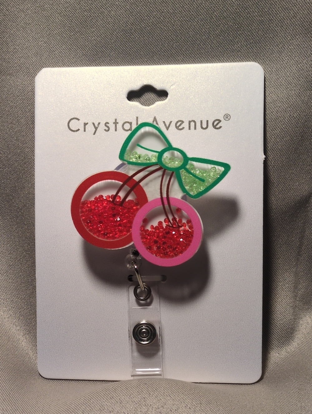 Crystal Avenue Green Bow Cherry Badge Reel